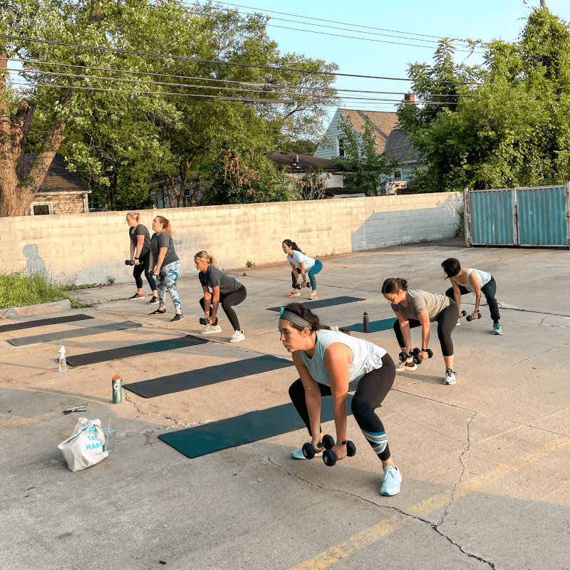 Nicole Nahed training women outside the studio.